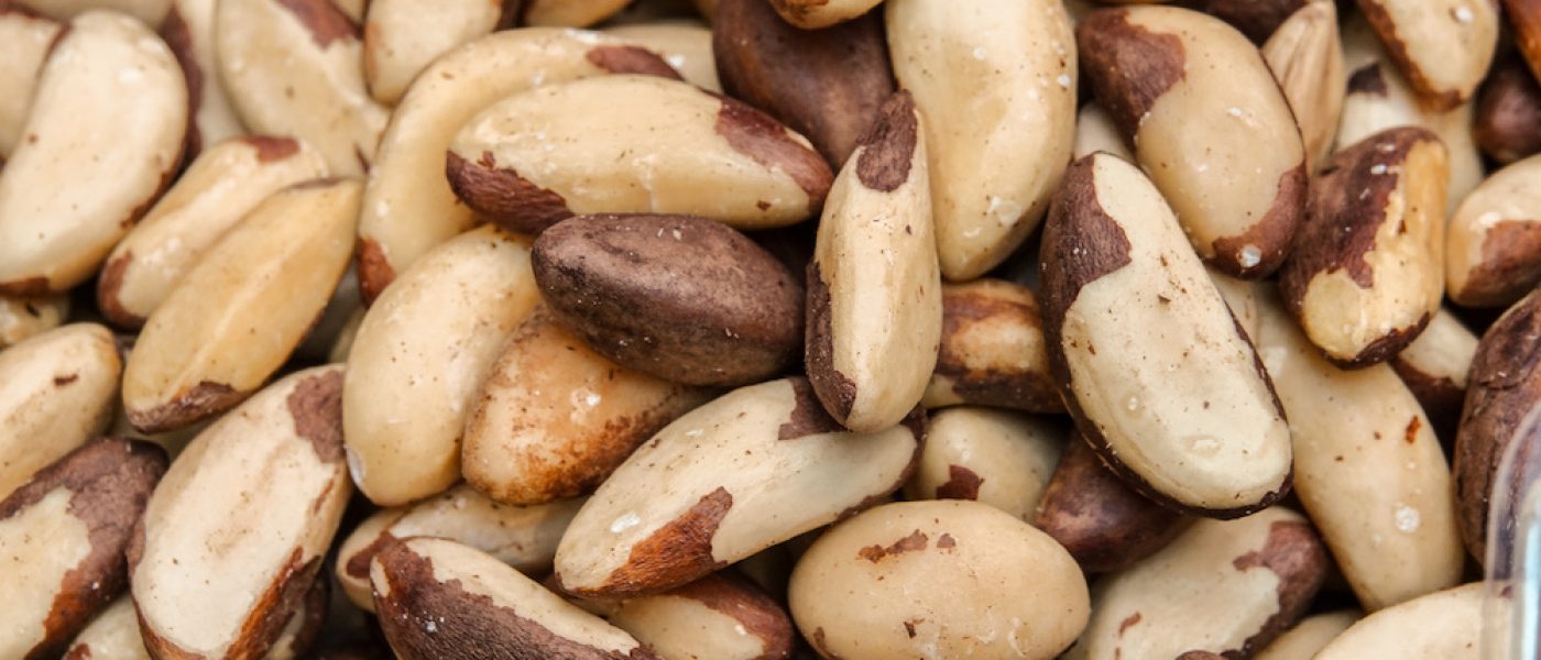 Tasty brazilian nut background. Horizontal image. Background of nuts texture.